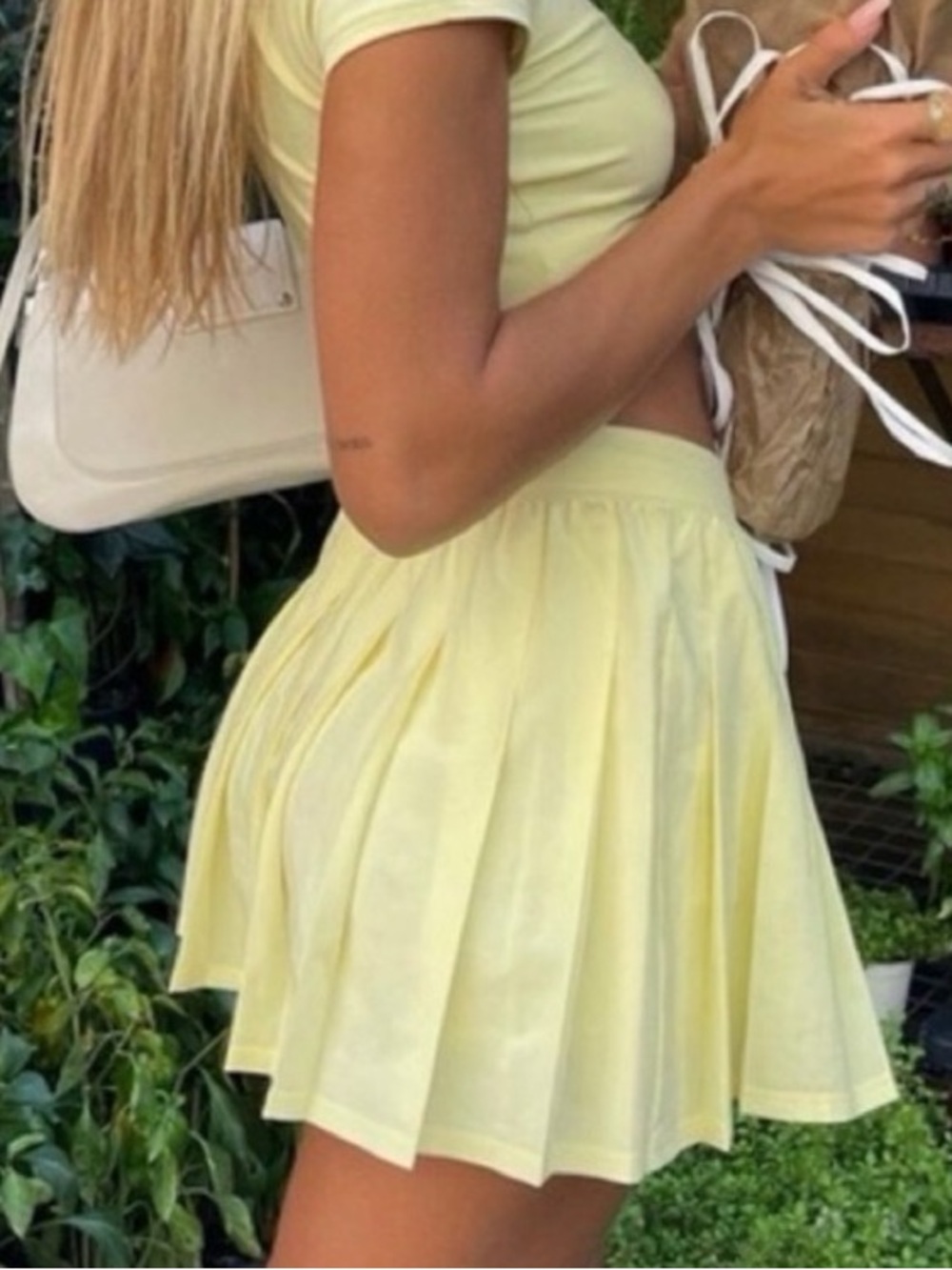 Alo Yoga Pleated Varsity Skirt in Buttercup Yellow